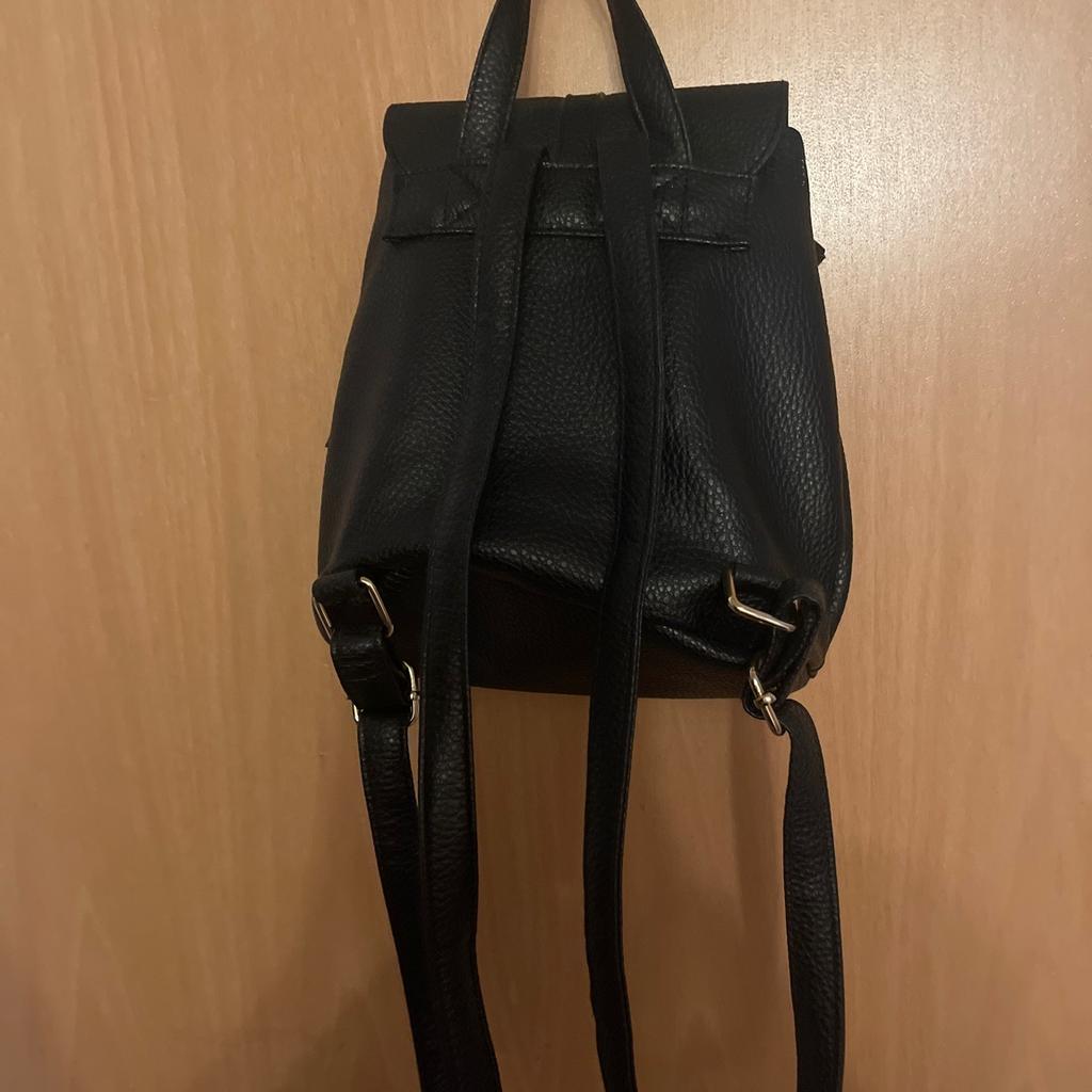Ladies black backpack, in good condition