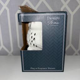 Brand new in box 
White owl plug in wax warmer 
Box slightly ripped