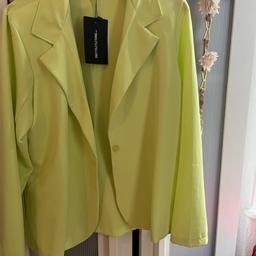 Beautiful bright green blazer blouse from pretty little thing new with tags on size 10 . Can deliver local