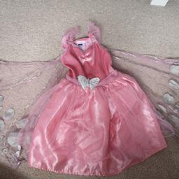 Age 1-2 years 
Angel / fairy costume
Wings are removable as they are attached by velcro to back of dress
1 velcro wrist strap is missing from  wings