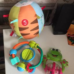 THIS IS FOR A BUNDLE OF BABY TOYS

1 X CIRCULAR RATTLE TOY - IT MOVES BY ROTATING - BY LITTLE TIKES
1 X LARGE SOFT FABRIC BALL WITH ANIMAL THEME
1 X CHICCO GREEN FROG RATTLE

ALL THE TOYS ARE USED BUT CLEAN AND PLENTY OF LIFE IN THEM

PLEASE SEE PHOTO
