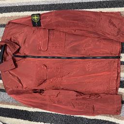 Red shinny Stone-island jacket. In perfect condition. Only worn once