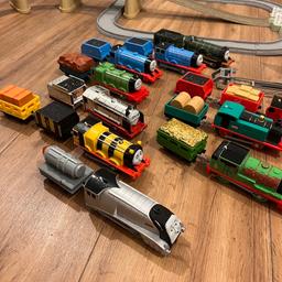 Includes 2 tracks, one large and the other glow in the dark (with 3 glow in the dark trains) there is a large number of motorised trains some still with batteries and others need new batteries. There are lots of the metal characters and some plastic ones too (tried to include it all in the pics) payment upon collection only