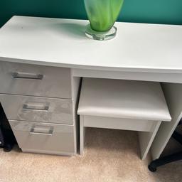 Lovely desk desk still in very good condition comes with the stool the only problem is on last picture u can there some marks fault off my I put insent stick on top it white and draws are very pale grey gloss