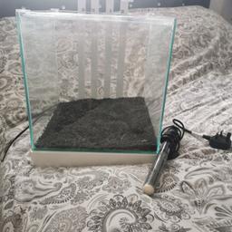 29cm cube fish tank.. On stand with lid and light... Heater included