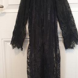 Ladies Cover up, size 10-12
Worn but in good condition
Collection or can post.
