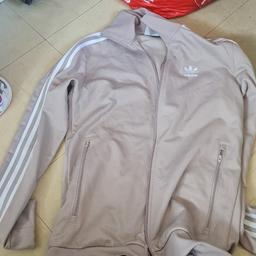 Unisex adidas jacket,
Like new,
Have beige and black see my other listingx. £15 or both black and beige for £20 postage dependent on weight. Will comebine p&p