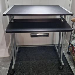 Very good condition with separate keyboard slide out tray and 4 (2 lockable) wheel casters.

Dimensions:
H 73cm approx.
W 62.5cm approx.
D 43cm approx.