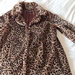 Ladies Faux Fur Leopard Print Size Large Coat. Excellent Condition.
Footnote...
See photos for condition size flaws materials etc. I can offer try before you buy option if you are local but if viewing on an auction site viewing STRICTLY prior to end of auction.  If you bid and win it's yours. Cash on collection or post at extra cost which is £4.55 Royal Mail 2nd class. I can offer free local delivery within five miles of my postcode which is LS104NF. Listed on five other sites so it may end abruptly. Don't be disappointed. Any questions please ask and I will answer asap.
Please check out my other items. I have hundreds of items for sale including bikes, men's, womens, and children's clothes. Trainers of all brands. Boots of all brands. Sandals of all brands. 
There are over 50 bikes available and I sell on multiple sites so search bikes in Middleton west Yorkshire.