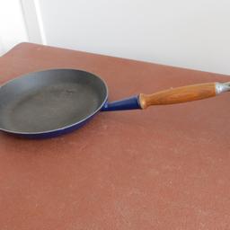Le Crueset large heavy based frying pan in dark blue with wooden handle.  Size is 10.5 in / 27cm diameter. Can only be used on gas appliances. Non stick and very functional.
Cash only and will have to be collected.
Kearsley, Bolton area