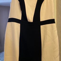 Smart dress either for the office or special occasion.
Black / Cream. Matalan “Papaya”. Sleeveless. Fully lined.