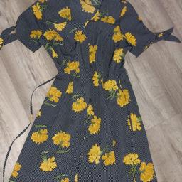 Perfect condition lovely tea dress, great material doesn't crease. Please see my other items, will combine postage