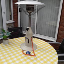 Table top gas patio heater with regulator. 3.4KW. Good condition, working but not been used for some time.