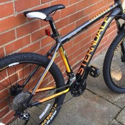 sterndale 1000 mens bike forme black oranage  As good as new Gel padded seat 
Pump 
Water bottle carrying
Complete with pedal pro 
And stand seat 
Will drop off in a 20 miles radius for additional costs