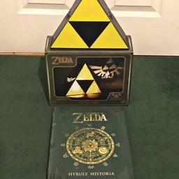 Perfect for a Legend of Zelda fan/collector.

Bundle: £49.99 
Individually: £24.99 ONO

Includes:
-The Legend of Zelda: Hyrule Historia
Beautiful full colour book bursting with trivia.
-The Legend of Zelda: Triforce Light
Ambient room decor and collectors piece.
*Fully packaged like new*

Items are used and have a few minor scuffs but ultimately remain in good condition.
