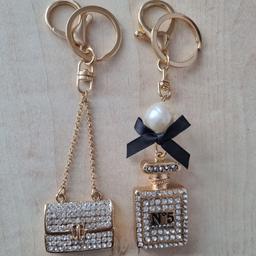 Cute designer look Ladies Keyring x 2. Chanel No.5 bottle and handbag. Lovely gifts. Never used so in great condition.