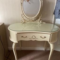 Dressing table with stool. Does have marks on stool and on the dressing table which is shown in the pictures.
Selling as moving house
W-92cm
H-77cm
D-48cm