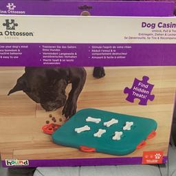 Dog treat casino. Put treats inside each door and let your dog figure out how to unlock to get the treat.