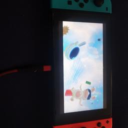 Nintendo switch in good working order. has hairline crack on screen but doesn't affect function... can't see crack when on... all working well. 9xgames
controllers... what is in pictures is what is for sale.