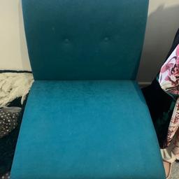 Teal coloured chair with brown wooden legs. Height from floor to top of back is 72cm. Height from floor to seat is 40 cm. Width is 51 cm. Depth is 60cm.