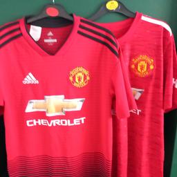 2 Manchester United tops one is age 15-16 and the other medium in good condition