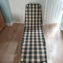 Sun lounger multi position in green and cream check very good condition .
One small mark on side as shown in picture