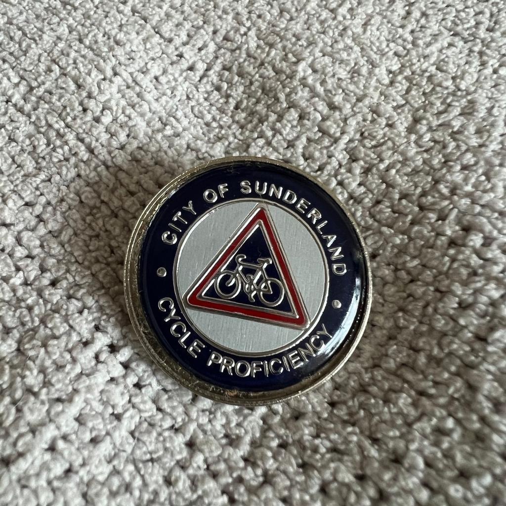 A vintage pin badge in new like condition.year 2000 Been stored away ideal for collectors
