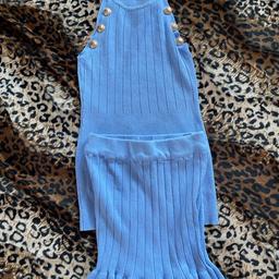 New - no tags - knitted Play Suits. Size 8/10. Top and shorts. Medusa buttons on top. 
Ivory & Blue. 
£20 per set. 
Collection from West Wickham.
No holding.