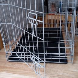 Dog cage used for 1 week.
Size 19 wide
 30 long
 22 depth
Excellent condition with tray.