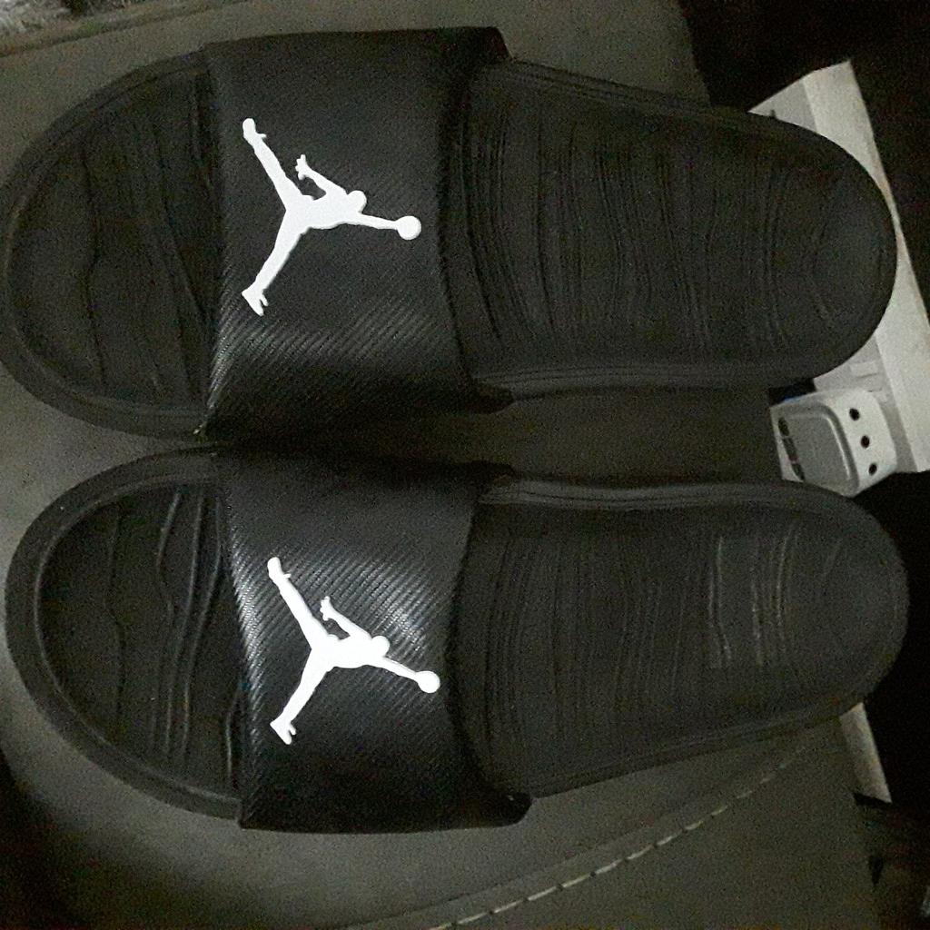 Selling a pair of Jordan Sliders, Size 5.5,Only worn couple of times, from smoke and Pet free home.NO OFFERS PLEASE NO HOLDING.