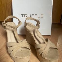 Truffle collection suede wedges.
Brand new and unworn.