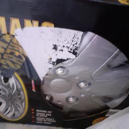 Brand new never used and stippling original packaging. 14" wheel trims.