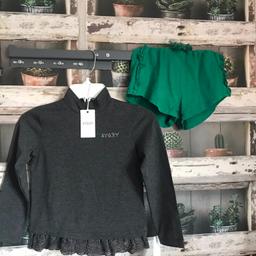 THIS IS FOR A BUNDLE OF GIRLS ITEMS

1 X GREY DESIGNER TOP FROM AYGEY - GREY POLO NECK STYLE TOP WITH GREY LACE ON THE BOTTOM OF THE GARMENT - COST £15
1 X GREEN SHORTS FROM TU - WASHED BUT NEVER WORN

PLEASE SEE PHOTO