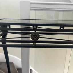 Wrought iron console table with glass top.
43in length 
30 in height 
13in width
Two slight marks on top as shown in picture.
Beautiful console table- selling due to refurbishment.