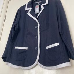 Navy blue linen/viscose jacket ( darker than photo shows). White contrast detail. Two pockets. Never worn … tags attached… also has spare button attached. If you require postage please ask first using the question option. Thanks very much.