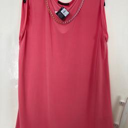 Salmon pink stretch top with cap sleeves and removable gold/silver coloured chain detail. Colour is lighter than photos suggest. Originally £8. If you require posting please ask first using the question option. Thanks very much