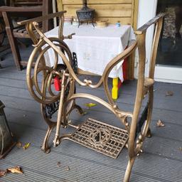New Orleans Sewing Machine Treadle Base
New Orleans logos on each side
Working foot plate & wheel
Painted gold with black wheel & logos
A lovely garden feature or perfect base for a table
Measures  72cm high x 52cm wide x  41cm deep at base