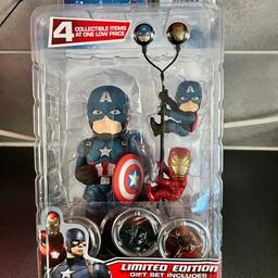 Captain America Civil War 
Limited edition gift set 
Solar powered captain America figure
Custom printed earbuds 
With 2 collectable scalers 
3 collectible hubsnaps 
New