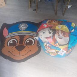 paw patrol rug, decent size.

Bean bag, needs some more beans. has zipper so beans can be removed and washed. 
paw patrol cushion.

Also there is a single bed duvet set you can have the lot.  it's not as bright in colour but still usable. 

all for £5 no offers