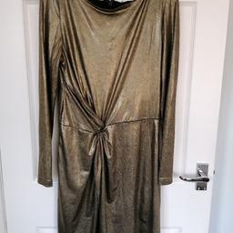 Great gold twist front dress.. Long sleeves with zip fastening at the back.. Was £45