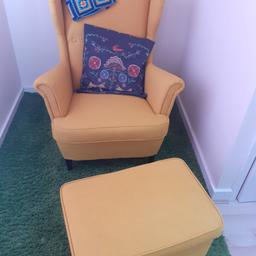 Ikea wing chair and footstool in Skiftebo yellow polyester fabric (55% polyester, 34% modacrylic and 11% cotton), with legs solid wood. Light texture and firm to the touch. Vacuum clean and wipe clean with a damp cloth. Cushion included. Already assembled. Offers accepted and collection only.