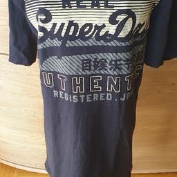 Tshirt in Größe XS von Firma Superdry in Farbe Blau. Länge 75 cm. Von Axel zur Axel 50 cm. 100%Baumwolle. Versand 4Euro