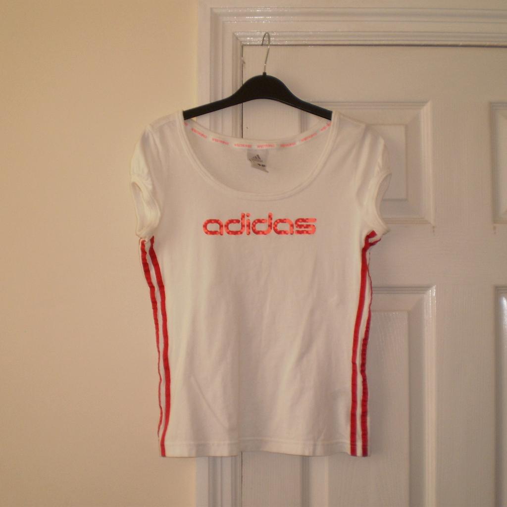 T-Shirts "Adidas" My Stripes

 White Red Mix Colour

Good Condition

Actual size: cm

Length: 56 cm

Length: 38 cm from armpit side

Shoulder width: 36 cm

Length sleeves: 10 cm

Volume hands: 36 cm

Volume bust: 83 cm – 94 cm

Volume waist: 74 cm – 86 cm

Volume hips: 75 cm – 88 cm

Size: 12 (UK) Eur 38

100 % Cotton

Made in Cambodia