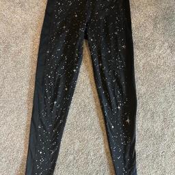 Woman’s new limited edition star design Nike sports leggings with black sparkle waste band size s