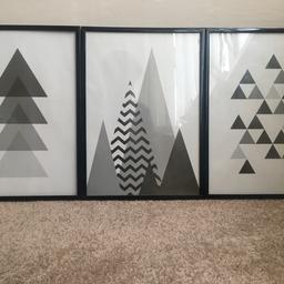 Selling 3 grey/black/white geometric pictures that come with black frames. Had them on a shelf in my sons room but we have redecorated. Can be hung up or placed on a shelf. Great condition. 
Size 
length 30cm 
Width 22cm
