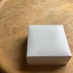 Pandora empty gift box see see secondary interior picture velvet lined gold lettering saying pandora also top of the white box has the word Pandora ok on Amazon these are £7 omg so mine is cheaper ideal for any Pandora gift ok clean immaculate condition surplus to requirements no offers pp or posting pet an smokeless house