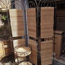 An unusual wicker and wrought iron room divider with matching wine rack/side table.
Excellent condition. 

Collection in Keston.