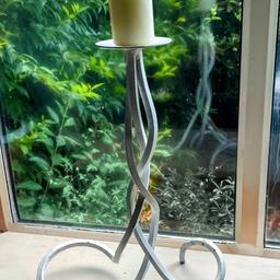 Lovely large shabby-chic wrought iron candle holder.
43cm tall