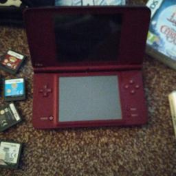 Nintendo dsi XL in good condition and working order comes with boxed and unboxed games