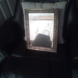 Arts and crafts mirror , brass border , solid wood back size 14" x 11" mirror in good condition pick up only Gargrave